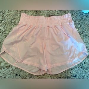 New without tags. Size 8. Track that, mid rise. 5 inch short. Light pink.